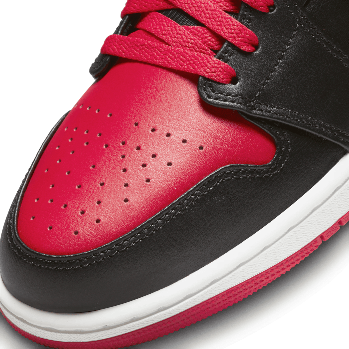 This Air Jordan 1 Mid References The Legendary Bred - Sneaker News