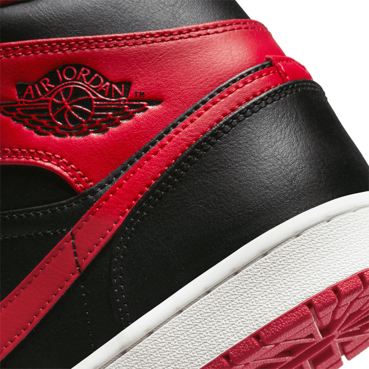 This Air Jordan 1 Mid References The Legendary Bred - Sneaker News